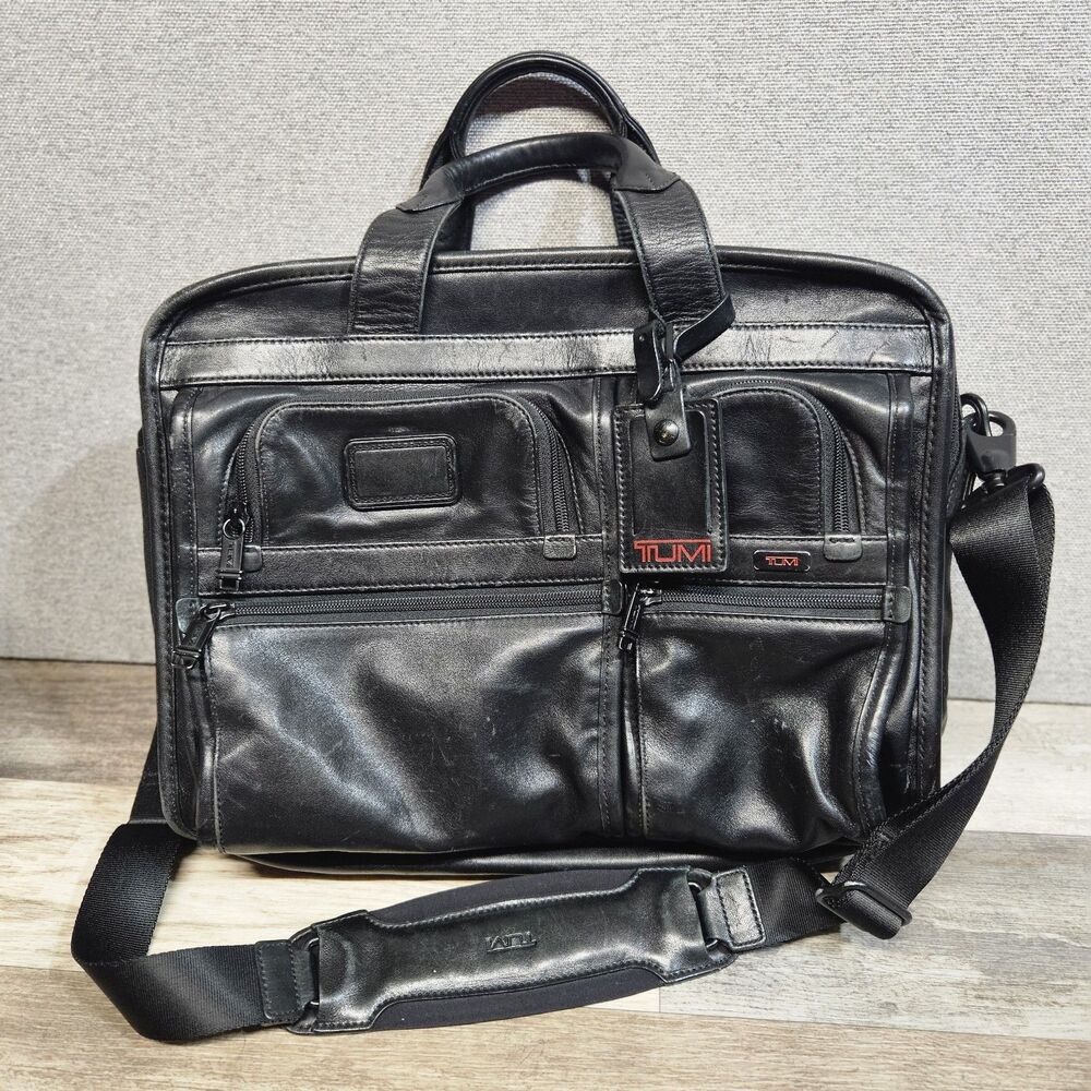 TUMI Black Leather Expandable Laptop Briefcase